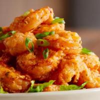 Voodoo Shrimp  · Lightly battered shrimp tossed in our homemade sweet and savory Voodoo sauce