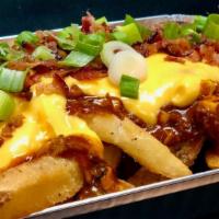 Cheesy Chili Fries · Personal Size Boardwalk Fries smothered classically in House Chili con carne, Cheesy Sauce, ...