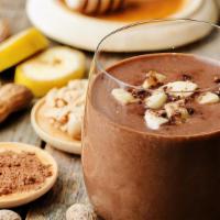 Peanut Butter Cup Smoothie · Banana and dark chocolate fortified with organic peanut butter