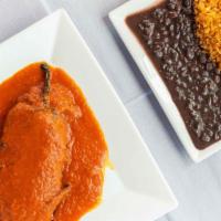 Chiles Rellenos · Stuffed poblano peppers with cheese in a tomato or green sauce. Served with Mexican rice, be...