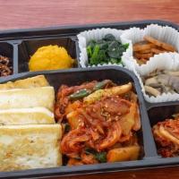 Stir-Fried Spicy Pork & Kimchi With Tofu · served with Korean side dishes, rice and soup of the day