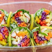 Summer Roll · Bell peppers, cucumber, red cabbage, carrot, lettuce, egg, crab stick, avocado, and shrimp w...
