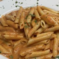 Penne Alla Vodka · Avellino's favorites. Smothered in a pink cream sauce.