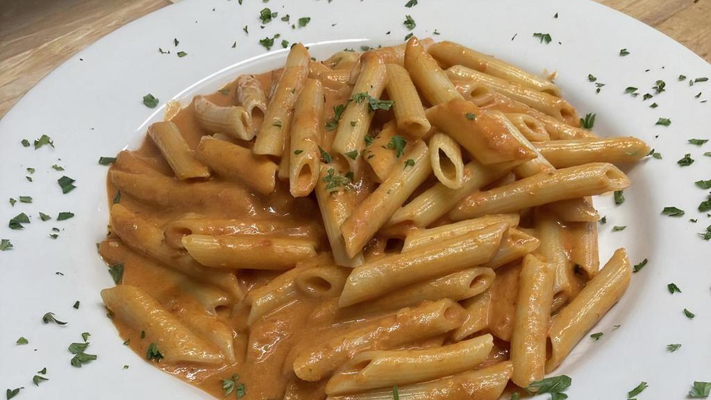 Penne Alla Vodka · Avellino's favorites. Smothered in a pink cream sauce.