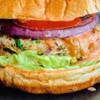 Chicken Burger · Fresh ground in house daily topped with lettuce, tomato, pickles & swiss cheese. Add Avocado...