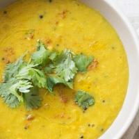 Dal Shorba · Made with lentils and spiced with dry ginger powder, pepper powder and cilantro.