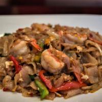 Pad Kee Moaw · Drunken noodles. Sauteed flat rice noodles with eggs, bell peppers, onions and thai basil. S...