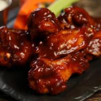 Classic Bbq Wings · Eight pieces of classic BBQ wings (mild heat).
