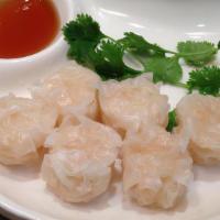 Shumai · Crab and vegetable dumplings steamed and served with hot mustard and soy sauce.
