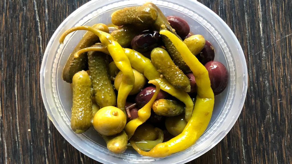 Olives & Pickles · Vegan, vegetarian. Dairy free, peanut free, tree nut free, egg free, shell fish free, gluten-free, fish free, and soy free. Queen and Empeltre olives, guindilla peppers, and cornichon.