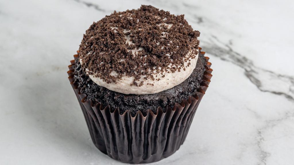 Cookies-N-Cream · Chocolate cake with our signature oreo vanilla buttercream topped with oreo cookies.
