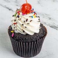 Hot Fudge Sundae · Chocolate cake filled with our signature buttercream frosting , sprinkles, hot fudge and a c...