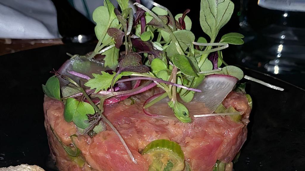 Saco Tuna Tartare · Cucumber, avocado, ginger, lemon oil dressing