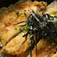 Katsudon · Pork cutlet w/egg and onion and sauce over rice.