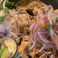 Jalea Clásica · traditional peruvian fried seafood platter served with ceviche* and leche de tigre.*