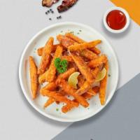 Sweet Potato Fries And Shine · (Vegetarian) Thick-cut sweet potato wedges fried until golden brown