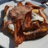 Lumberjack · Pancakes or French toast with, ham, bacon, sausage and 2 eggs.