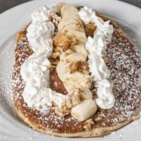 Nutella Pancakes · Nutella, bananas, walnuts and whipped cream.