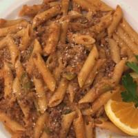 Penne Bolognese · Meat sauce and choice of side.