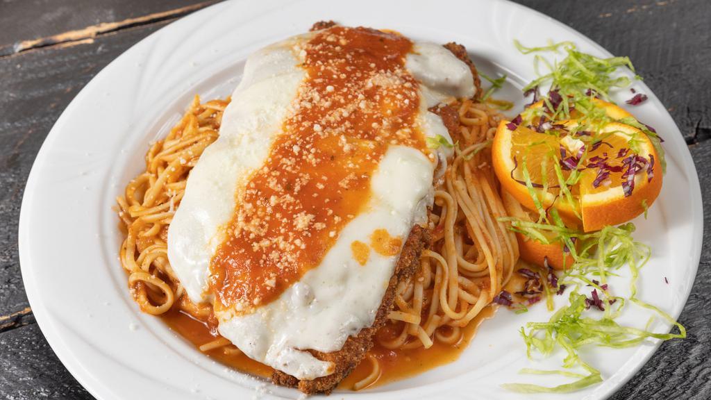Chicken Parmigiana · Tomato sauce and mozzarella served with pasta and choice of side.