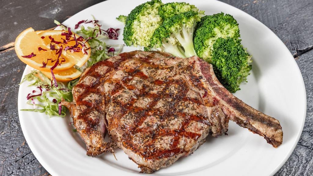 Rib Eye Steak · 16 oz certified angus beef, potato and vegetable. Served with choice of side.