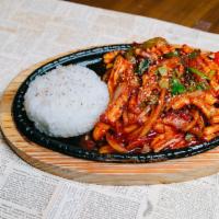 Spicy Stir-Fried Squid Combo · Marinated squid over rice with tofu soup.