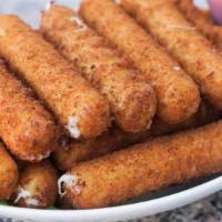 Mozzarella Sticks · Mozzarella sticks served with homemade marinara sauce for dipping.