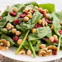 Fresh Spinach Salad · Fresh spinach, roasted walnuts, goat cheese, cranraisins, and chicke peas.