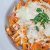 Baked Ziti · Al dente pasta smothered in our homemade marinara sauce and baked with ricotta and mozzarell...