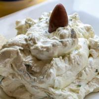 Tzatziki · Tangy cucumber garlic dip made with Greek yogurt.