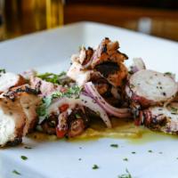 Octapodi · Braised sushi grade octopus, char-grilled, sliced and tossed in olive oil, parsley, red pepp...
