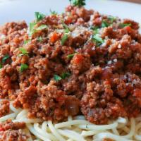 Makaronia Me Kima · Spaghetti with our delicious meat sauce. Served with side salad.