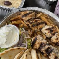 Gyro Platter · Delicious authentic gyro cooked slowly, sliced thinly. Served with pita bread, tzatziki, let...