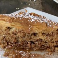 Baklava · Layers of rich sweet phyllo pastry filled with chopped nuts and honey.