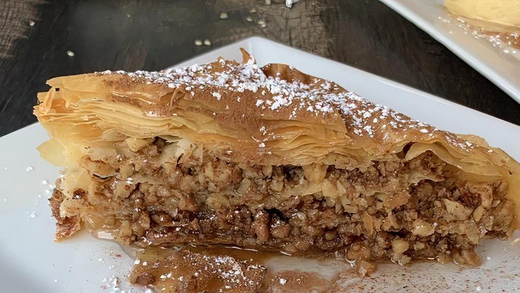 Baklava · Layers of rich sweet phyllo pastry filled with chopped nuts and honey.