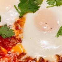 Shakshuka · Traditional Israeli 3 egg breakfast with pepper, onions, and special tomato sauce.