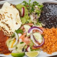 Plato De Bistec Ranchero · Grilled onions and cheese. Served with salad, rice, beans, and tortillas.