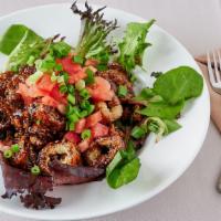 Calamari Balsamico · Fried calamari tossed with balsamic glaze, buffalo sauce, topped with chop tomatoes, and sca...