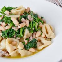 Orecchiette Barese · Ear shaped pasta served with crumbled sausage, broccoli rabe, pepper flakes and white cannel...