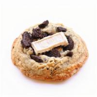 Cookies And Cream · Cookies & Cream cookie topped with crushed Oreos and Hershey's Cookies & Cream chocolate