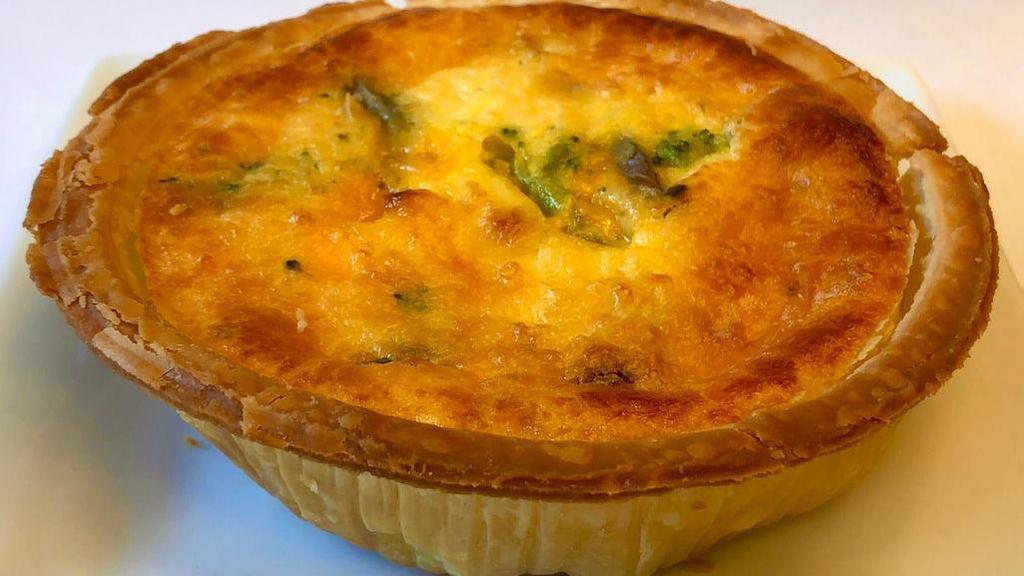 Food & Dairy|Broccoli Quiche · Fresh broccoli & shaved cheddar cheese make this quiche a perfect, decadent gourmet meal or treat. 520 Calories