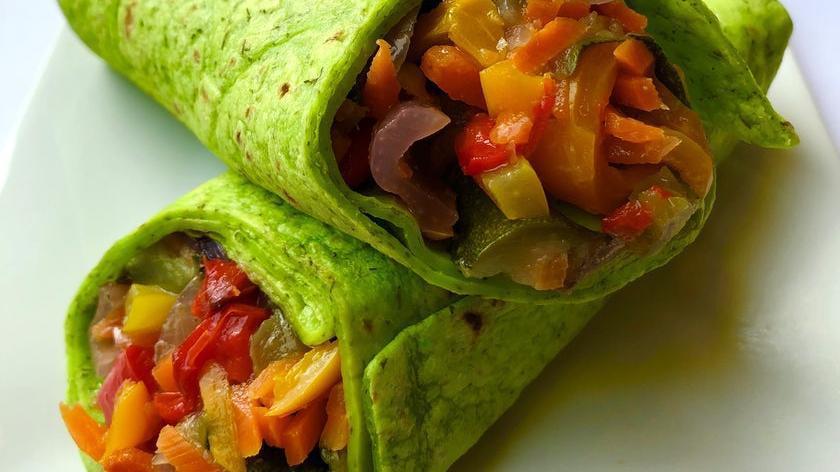 Food & Dairy|Roasted Vegetable Wrap · Charred red peppers, green peppers, yellow peppers, portobello mushrooms, zucchini, squash, red onion, carrots. This Vegan wrap is a Garden of Delight.