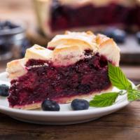 The Blueberry Pie · Juicy, plump, fresh farmers market locally grown blueberries in a flaky crust.