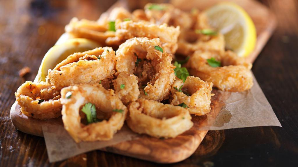 Fried Calamari · Calamari rings are breaded and fried until golden.