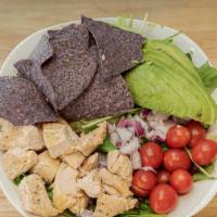 Chicken Avocado Salad · Mixed spring greens, avocado, roasted chicken, red onions, grape tomatoes and gf organic tor...