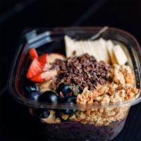 Peanut Butter Acai Bowl · Filling(acai berry, banana, blueberry, cacao powder, and peanut butter blend). Topped with g...