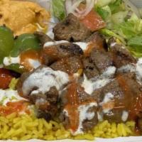 Lamb Platter · Specially cut and marinated, our lamb kabobs are juicy and flavorful! Comes with Hummus, Sal...