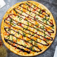 The Vegan Bbq Pizza Club · Vegan BBQ topped on a pie with homemade tomato sauce, vegan cheese, and a blend of seasoning