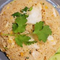 Crab Fried Rice · Crabmeat, onion, scallions, egg mixed with rice.
