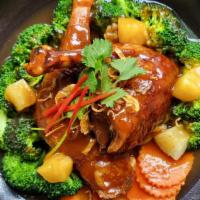 Crispy Duck Tamarind · Crispy Half Duck, Steamed mixed vegetables, Pineapples topped with tamarind sauce and fried ...